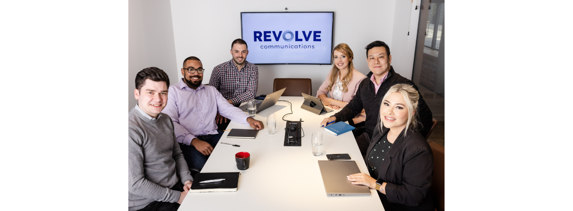 Revolve group pic in office banner v4